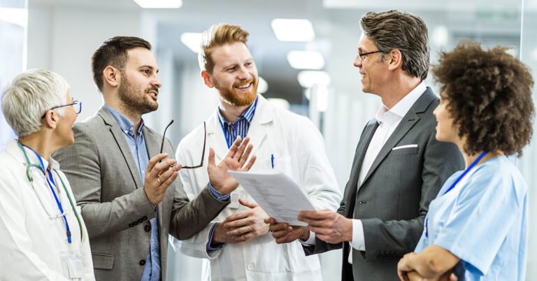 1733263968healthcare-administrator-meeting-with-staff-1200x628-1-768x402.jpg